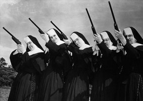 row-of-nuns-aiming-rifles.jpg