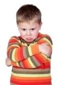 9188337-angry-child-with-crossed-arm-isolated-on-white-background.jpg