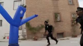 police-wacky-waving-inflatable-tube-man.gif