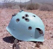UN-helmet-bullet-holes-paranoid-republicans.jpg