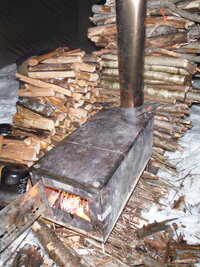 wood stacked stove ecr 2014.JPG