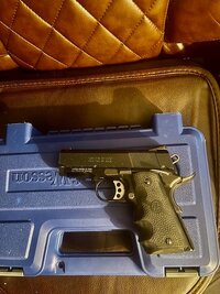 Smith & Wesson Pro Series SUBCOMPACT 45 ACP 1911. Left on case 2.jpg
