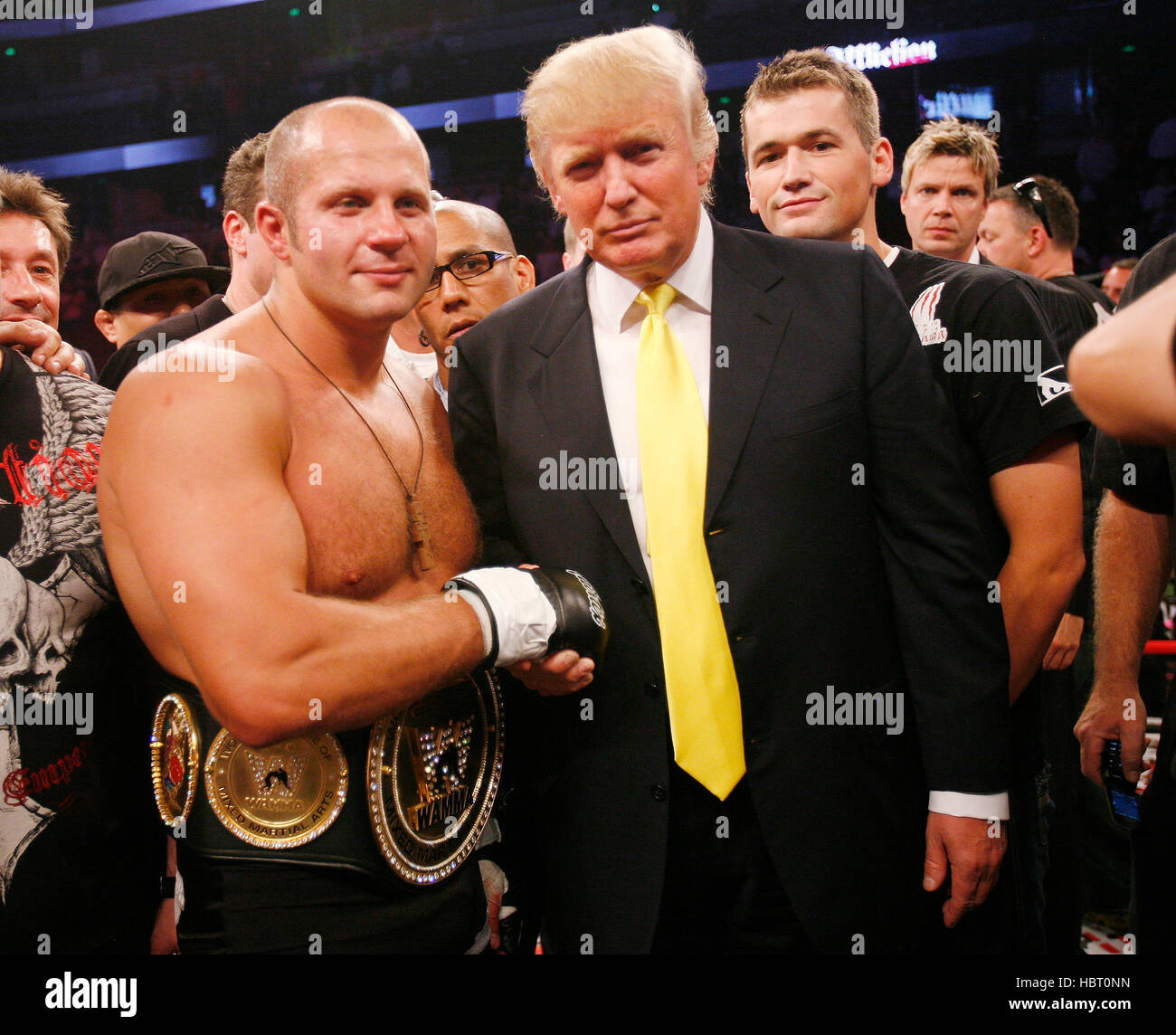 fedor-emelianenko-poses-with-donald-trump-in-the-ring-after-defeating-HBT0NN.jpg