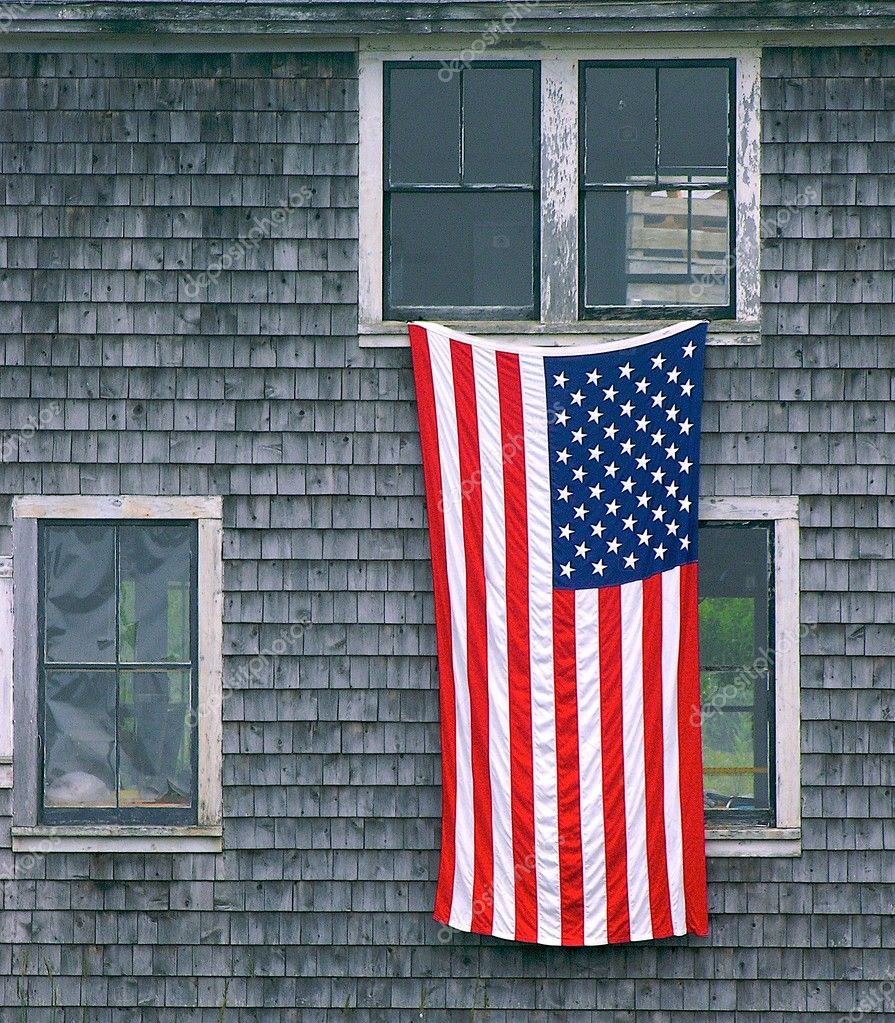 depositphotos_2521317-U.S.-Flag-hanging-on-building.jpg
